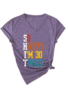 Detail of V-neck purple T-shirt with So Happy I'm 30 Twice print and side knot detail