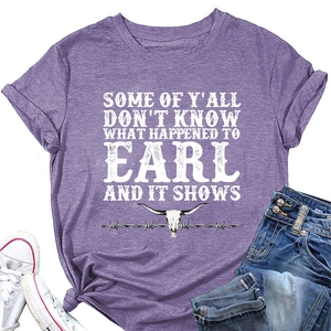 Detail of purple cotton T-shirt featuring bull skull print and English slogan with casual wear