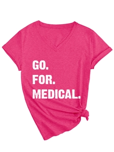 Close-up of hot pink V-neck t-shirt featuring Go For Medical text and side knot detail