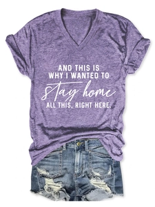 Detail of purple V-neck T-shirt with white text and distressed denim shorts set