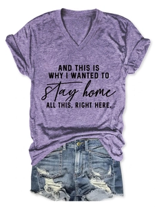 Flat lay of purple V-neck heather t-shirt and light blue distressed denim shorts