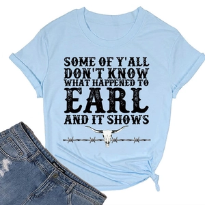 Detail of light blue t-shirt with bull skull print and stylish side knot design