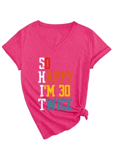 Close-up of rose pink V-neck T-shirt with So Happy I'm 30 Twice slogan and side knot