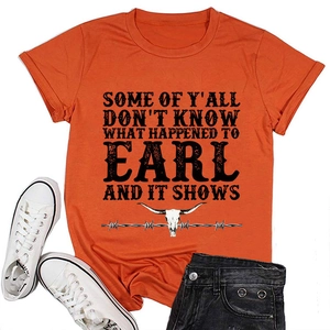 Detail of orange cotton T-shirt featuring a vintage bull skull and graphic text print