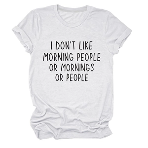 Close-up of white cotton T-shirt featuring I Don't Like Morning People slogan print