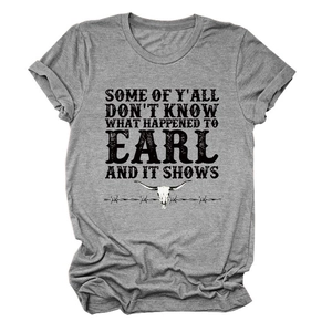 Detail of vintage bull skull and retro typography print on grey cotton t-shirt