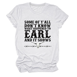 Close-up of vintage longhorn skull and text graphic on white cotton T-shirt