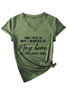 Detail of dark green V-neck T-shirt with black printed slogan and stylish side knot design