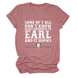 Detail of dusty rose T-shirt featuring vintage longhorn skull and barbed wire graphic