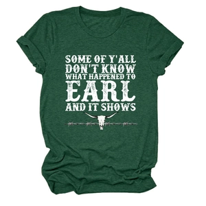 Detail of dark green t-shirt with white bull skull print and cowgirl quote text