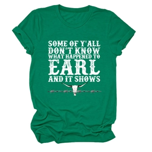 Detail of green cotton t-shirt featuring a longhorn skull and western quote graphic