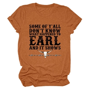 Detail of orange heather t-shirt featuring black bull skull and vintage text print