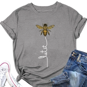 Flat lay of gray cotton t-shirt with bee and let it be print, paired with blue jeans