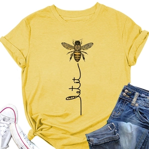 Detail of yellow cotton bee t-shirt with let it be print and rolled cuff sleeves