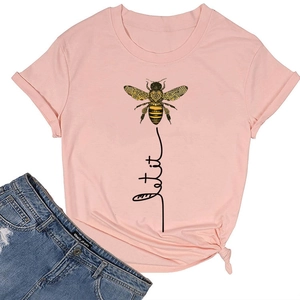 Detail of pink cotton T-shirt featuring bee graphic, let it be text, and side knot detail