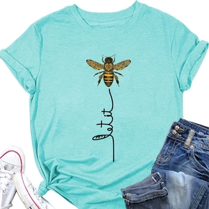 Detail of mint green cotton T-shirt featuring a bee print and Let it be script text