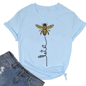 Detail of Let it be bee print and side knot design on light blue cotton T-shirt