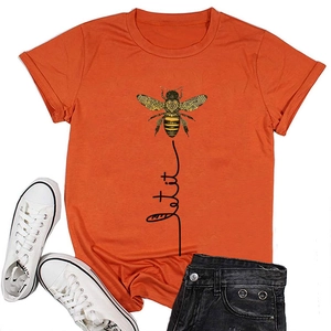 Flat lay of an orange cotton T-shirt featuring a detailed bee and Let it be design