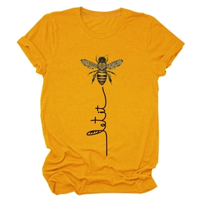 Close-up of the bee graphic and Let it bee text on a mustard yellow cotton t-shirt