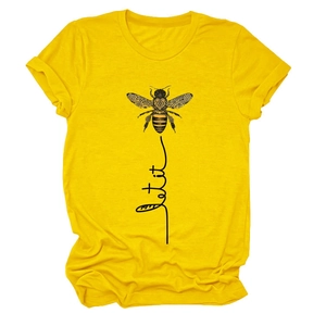 Detailed close-up of yellow cotton T-shirt featuring bee graphic and let it be text