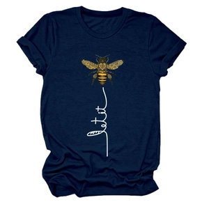 Detailed view of the bee graphic and Let it be lettering on a navy blue t-shirt