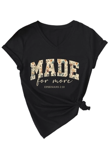 Detail of V-neck T-shirt with MADE FOR MORE floral print and stylish front knot hem