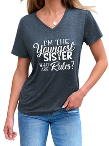 Detailed close-up of charcoal grey V-neck tee featuring youngest sister text print