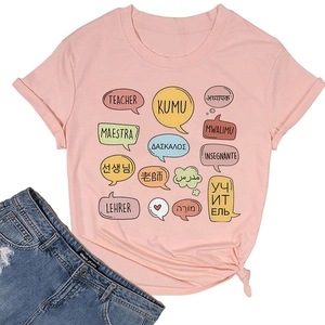 Detail of pink cotton T-shirt featuring multilingual teacher print and knotted hem detail