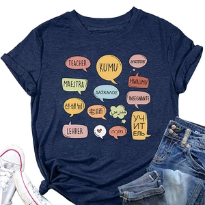 Detail of navy cotton blend T-shirt with colorful multilingual teacher prints and front knot