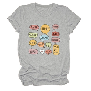 Flat lay of a grey crew neck t-shirt with colorful multilingual teacher print design