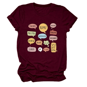 Detail of burgundy Teacher T-shirt featuring multilingual speech bubbles on cotton fabric