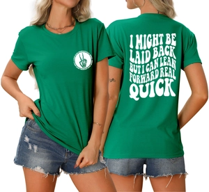 Front and back view of green t-shirt with I Might Be Laid Back typography and skull badge