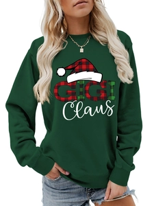 Λεπτομέρεια της στάμπας GIGI Claus με κόκκινο καρό σχέδιο και σκούφο σε πράσινο φούτερ