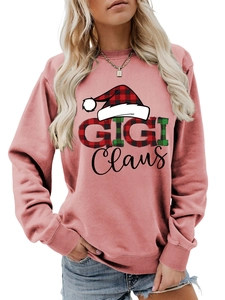 Λεπτομέρεια του ροζ γραφικού Gigi Claus με χριστουγεννιάτικο καπέλο σε φούτερ λαιμόκοψη