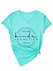 Detail of mint green V-neck T-shirt with black circular print and side knot hem design