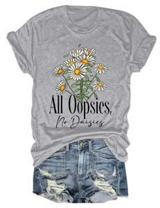 Detail view of cotton t-shirt with daisy print and distressed denim shorts set
