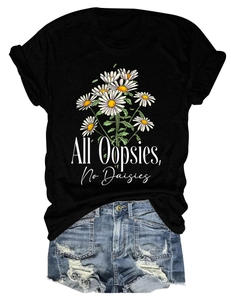 Detail of floral print on cotton tee and distressed denim shorts in summer set
