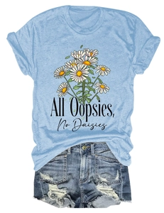 Detail of light blue t-shirt with daisy floral print and 'All Oopsies No Daisies' slogan