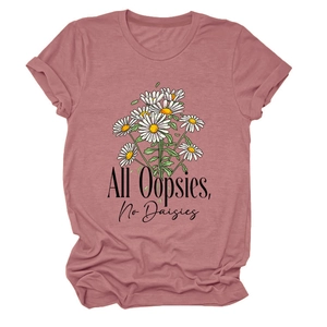 Detail of dusty pink T-shirt featuring 'All Oopsies, No Daisies' text and daisy print