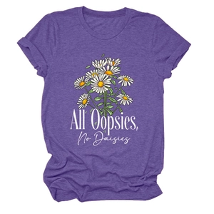Detail of purple heather texture and All Oopsies No Daisies daisy print on a t-shirt