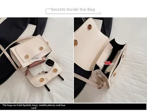Detail view of cream leather crossbody bag interior showing main pocket and daily essentials