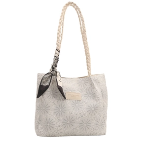 Quilted tote bag with daisy embroidery, rope handles and decorative silk scarf