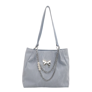 Light blue large capacity tote bag with silver butterfly charm and pearl chain details