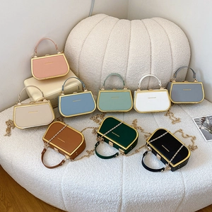 Miniature box handbags in multiple candy colors with golden chain and top handle strap