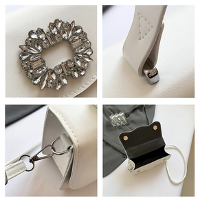 Detail shots of white leather crossbody bag with crystal flower buckle and silver hardware