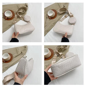 Vue détaillée du sac croissant en cuir tressé avec porte-monnaie amovible et bandoulière
