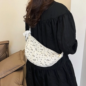 Floral canvas crescent bag for women with lace bow detail and crossbody shoulder strap