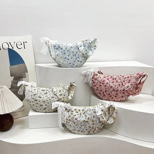 Floral crossbody bags with lace bows in assorted colors for a sweet summer look