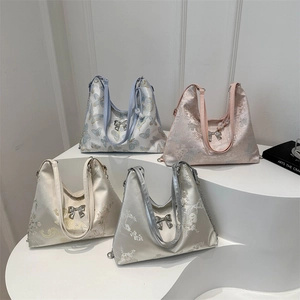 Chic jacquard tote bag set with floral patterns and butterfly charms for women