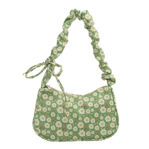 Green floral tote bag with daisy pattern and ruched handle on white background
